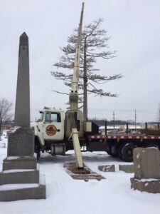 Tree service in graveyard